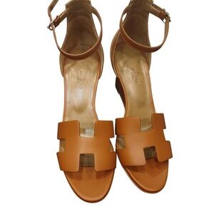 Hermes Legend Sandal in calfskin with iconic "H" cut-out, wedge heel.